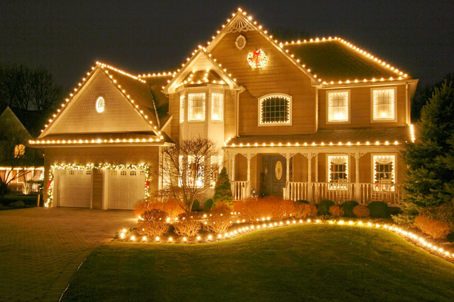 house and driveway holiday lights