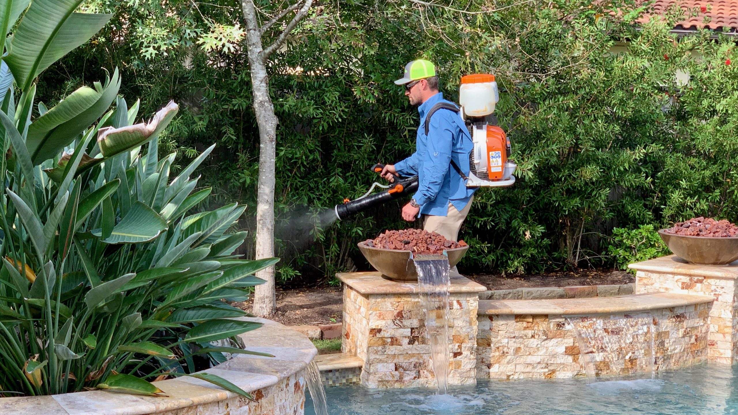 GreenGate Turf technician performing mosquito control service