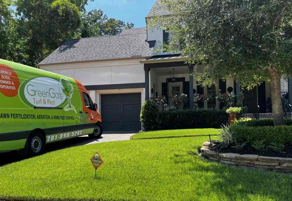 A van is parked on the lawn to provide Lawn fertilization service in Sugar Land, TX.