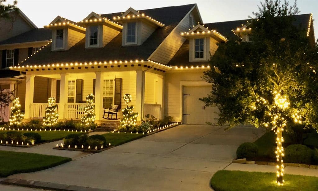 Holiday home light installation for Christmas done by GreenGate Turf & Pest in Cypress, TX