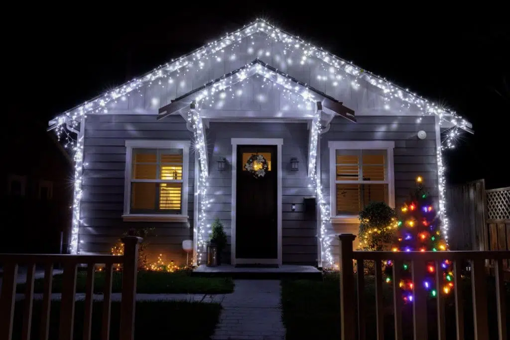 A home decorated for Christmas by GreenGate Turf & Pest in Cypress, TX