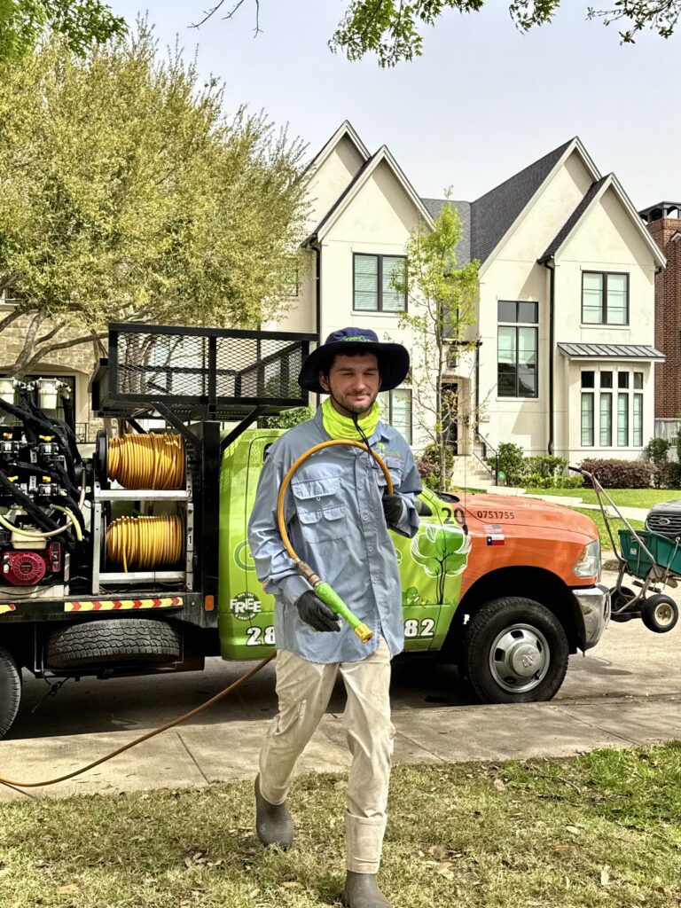 Local Lawn Care Company, GreenGate Turf & Pest, technician treating lawn in Houston, TX