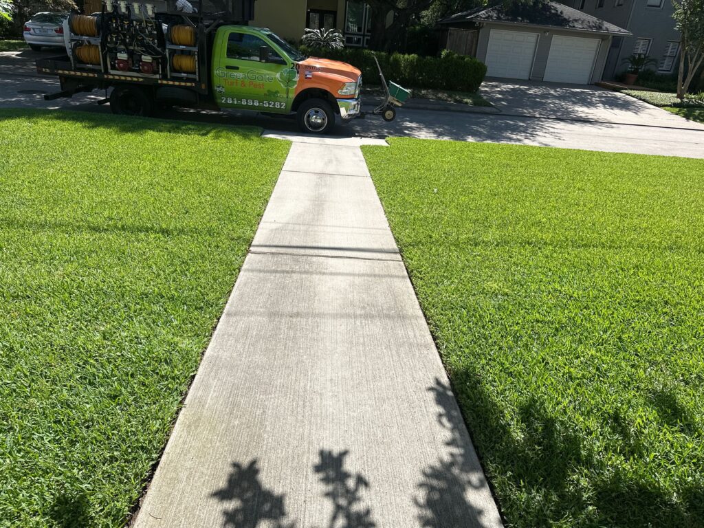 Turf Service West University Place by GreenGate Turf & Pest | Beautiful Green Lawn and GreenGate Truck Parked in Front