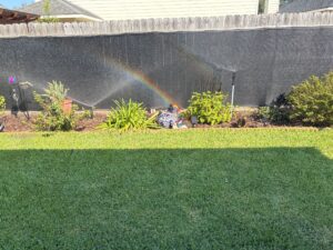 Flower bed sprinkler zones running while being tested during a sprinkler start up service