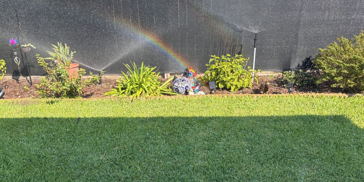 Flower bed sprinkler zones running while being tested during a sprinkler start up service